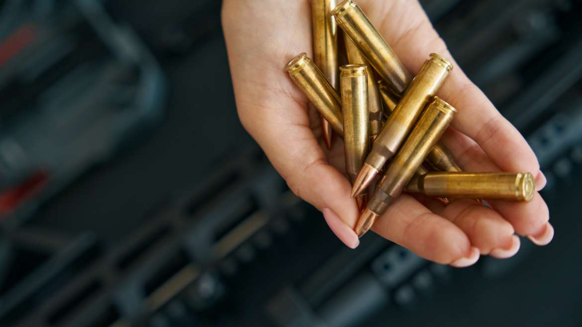 Combat cartridges on a tender female palm